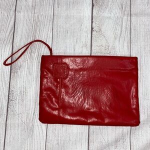 Clutch purse with wrist strap, zipper closure red
